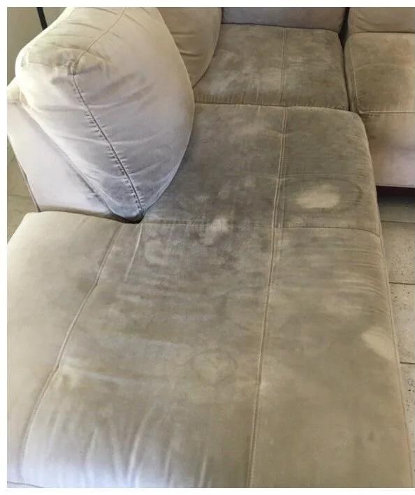 Corner sofa, family home before cleaning
